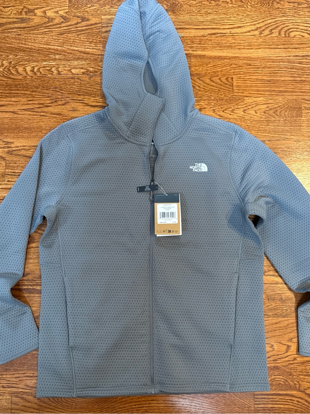 The North Face Men’s Hooded Perforated Jacket — Gray